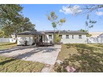 Spacious backyard featuring a concrete patio perfect for outdoor entertaining and relaxing at 2800 E Anderson St, Orlando, FL 32803