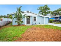 Charming single-story home with a well-maintained lawn and fresh landscaping in a quiet residential neighborhood at 1022 Baycrest Dr, Lakeland, FL 33805