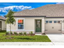 Charming single-story home with a well-manicured lawn and attached one car garage at 3228 Seville St, Lake Alfred, FL 33850