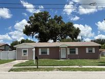 Charming single-story home with well-maintained lawn and lovely curb appeal at 3435 Swindell Rd, Lakeland, FL 33810