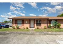 Charming single-story home with a well-maintained lawn and mature landscaping at 89 Fremont Ave # 504, Daytona Beach, FL 32114