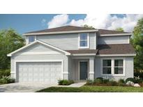 Charming two-story home with a two-car garage and well-manicured landscaping at 4732 Babys Breath Pl, Kissimmee, FL 34758