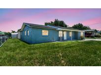 Charming single-story home with a well-maintained lawn and cozy front porch at 2902 Wheeler St, Bartow, FL 33830