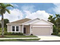 Charming single-story home with attached garage, landscaped yard, and neutral siding at 2373 Broadbrook Drive, St Cloud, FL 34771
