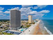 Aerial view of beachfront high-rise building with ocean and city views at 2200 N Atlantic Ave # 1502, Daytona Beach, FL 32118