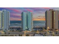 Oceanfront building with sunset view; resort-style amenities at 3047 S Atlantic Ave # 1906, Daytona Beach, FL 32118