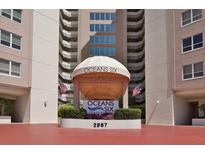 Oceans Six Condominium building entrance with red brick driveway at 2967 S Atlantic Ave # 1706, Daytona Beach, FL 32118
