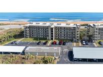 Beachfront condo building with assigned parking and ocean views at 3180 Ocean Shore Blvd # 309, Ormond Beach, FL 32176