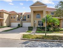 Charming townhome with well-maintained landscaping, brick driveway and attached garage at 3613 Casalta Cir, New Smyrna Beach, FL 32168