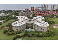 Wonderful aerial view of this condo building with a beach access walkway nearby at 4 Oceans West Blvd # 601A, Daytona Beach Shores, FL 32118
