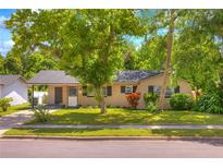 Charming single-story home featuring a well-manicured lawn and inviting front entrance at 741 Greenway Pl, Daytona Beach, FL 32114