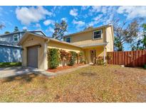 Charming two-story home with well-maintained landscaping and a cozy front yard, located in a desirable neighborhood at 1118 Meditation Loop, Port Orange, FL 32129