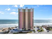 Stunning beachfront condo building with multiple floors and private balconies at 1900 N Atlantic Ave # 1603, Daytona Beach, FL 32118