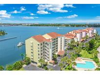 Stunning waterfront condos offer beautiful views, a community pool, boat dock, and lush landscaping at 521 Marina Point Dr # 521, Daytona Beach, FL 32114