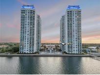 Stunning waterfront condo towers with a pool and clubhouse nestled between the two buildings at 241 Riverside Dr # 601, Daytona Beach, FL 32117