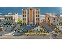 Stunning oceanfront condo building with meticulously maintained landscaping and a convenient parking area at 3799 S Atlantic Ave # 601, Daytona Beach, FL 32118