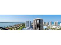 Beautiful aerial view of beachfront condos on the coast with golf course and river views at 1 Oceans West Blvd # 20B4, Daytona Beach, FL 32118