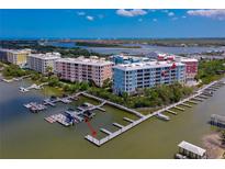 Colorful waterfront condos featuring private docks and boat slips with stunning views of the intercoastal waterway at 3 Riverwalk Dr # 404, New Smyrna Beach, FL 32169