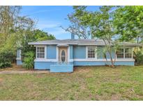 Charming blue single-story home with a landscaped front yard and light-colored trim at 263 Seaview Ave, Daytona Beach, FL 32118