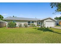 Charming single-story home featuring a well-manicured lawn and updated metal roof in a desirable neighborhood at 1317 Suwanee Rd, Daytona Beach, FL 32114