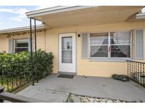 Charming front porch with decorative shutters and a well-maintained exterior at 441 E Kicklighter Rd, Lake Helen, FL 32744