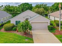 Charming single-story home featuring manicured landscaping and a two-car garage, perfect for comfortable living at 276 Gala Cir, Daytona Beach, FL 32124