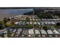 Waterfront community offering a serene lifestyle with access to canals and lake views from the backyard at 119 Jana Cir, Auburndale, FL 33823