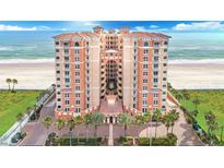 Stunning oceanfront condo building with a private beach access and manicured landscaping at 3245 S Atlantic Ave # 304, Daytona Beach Shores, FL 32118