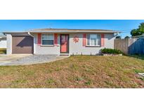 Charming single-story home featuring a well-maintained lawn and inviting front entrance at 26 Ocean Shore Dr, Ormond Beach, FL 32176