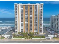 High-rise condo complex on a clear, sunny day with ocean views and beach access at 3003 S Atlantic Ave # 17A1, Daytona Beach Shores, FL 32118
