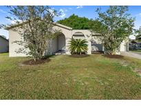 Charming single-story home with stucco exterior and lawn at 541 Northwestern Ave, Altamonte Springs, FL 32714