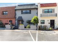 Charming townhome with beautiful landscaping, private entrance and assigned parking at 625 N Halifax Ave # 11, Daytona Beach, FL 32118