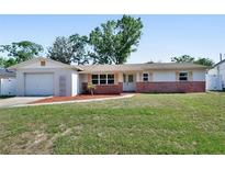 Charming single-story home with a well-maintained front yard and an attached single-car garage at 920 Trafalgar St, Deltona, FL 32725
