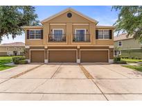 Inviting townhome with attached garages and private balconies in a well-maintained community at 1469 Broken Oak Dr # 43A, Winter Garden, FL 34787