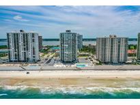 Beautiful aerial view of beachfront condo towers and the ocean in Daytona Beach, Florida at 2987 S Atlantic Ave # 903, Daytona Beach, FL 32118