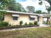 Charming single-story home featuring a well-maintained front yard and classic design at 2647 Brookline Ave, New Smyrna Beach, FL 32168