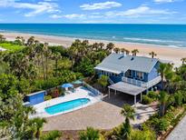Beautiful oceanfront home featuring a private pool and carport with stunning views of the ocean at 2833 S Atlantic Ave, Daytona Beach, FL 32118