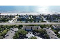 Coastal community featuring residential buildings with access to the beach and tennis courts at 4403 Sea Mist Dr # 2110, New Smyrna Beach, FL 32169