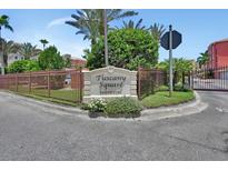 Welcoming entrance to Tuscany Square Condominiums with a well-maintained sign and landscaping at 424 Luna Bella Ln # 330, New Smyrna Beach, FL 32168