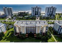 Stunning oceanfront condo building offering breathtaking views and luxurious amenities at 5300 S Atlantic Ave # 12-401, New Smyrna Beach, FL 32169