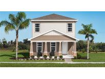 Two-story house with light beige siding, a front porch, and palm trees at 3744 Sky Mountain Aly, Apopka, FL 32712