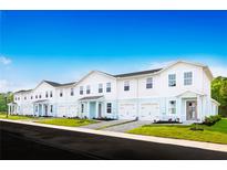 Brand new townhouses with two-car garages and landscaped yards at 281 Tahiti Rd, Lady Lake, FL 32159