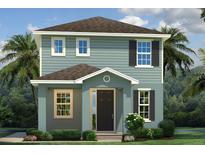 Charming two-story home with a covered entry, black shutters, and lush tropical landscaping at 3828 Denali Dr, Apopka, FL 32712