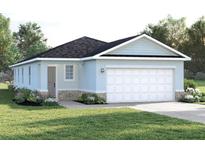 Charming single-story home with a two-car garage, nicely landscaped front yard and stone accents at 5056 Bear Lake Loop, Deland, FL 32724