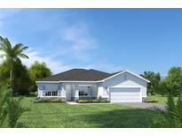 Charming single-story home with a well-manicured lawn, attached garage, and lovely landscaping at 11018 Nellie Crossing Cir, Clermont, FL 34711