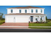 Two-story home with brick driveway, three-car garage, covered porch, and manicured lawn at 9836 Pine Mill Ct, Clermont, FL 34711