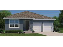 Charming single-story home with a neatly landscaped front yard and a two-car garage at 3758 Voyageurs Ct, Apopka, FL 32712