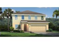 Charming two-story home featuring a well-manicured lawn and an attached two-car garage at 5739 Anders Way, St Cloud, FL 34771