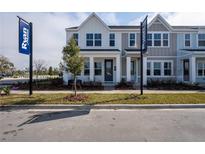 New construction home with neutral tones, landscaped yard, and covered entryway at 558 Highfalls Ave, Debary, FL 32713