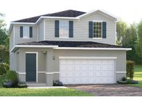 Charming two-story home with gray siding, black shutters, and a two-car garage at 6524 Domizio Dr, Winter Haven, FL 33884